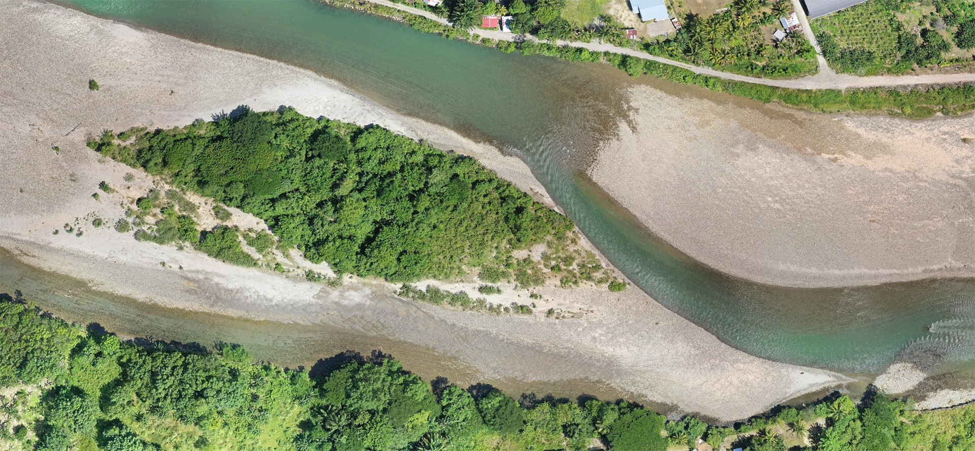 Aerial drone survey capturing river sedimentation patterns after earthquake in Sabah