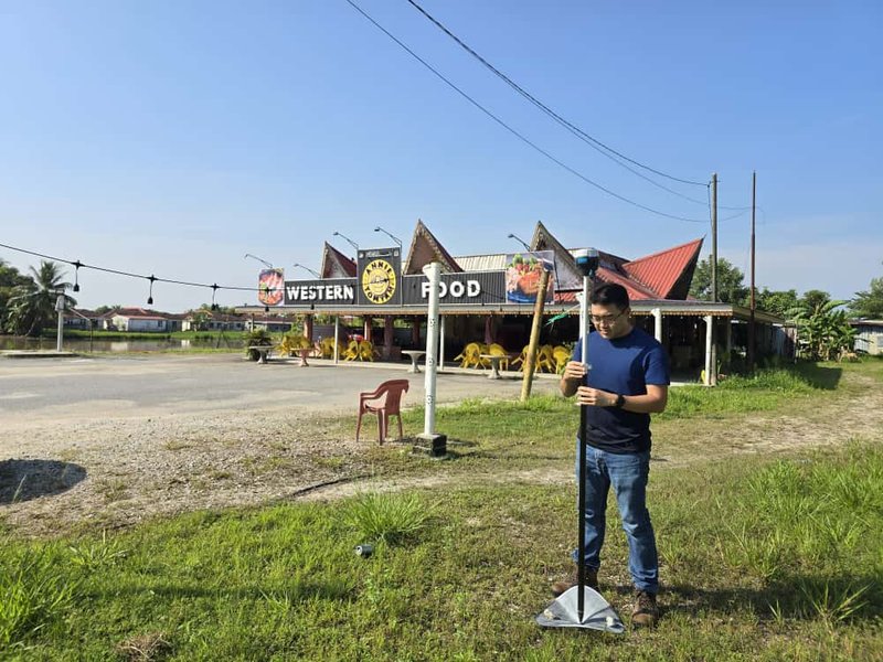 Dronify team member setting up RTK base station for survey-grade accuracy